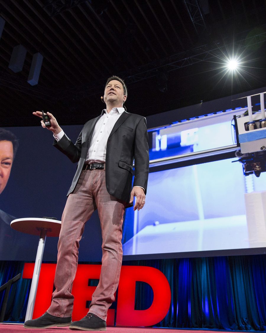 Rick Smith speaking on the TED stage